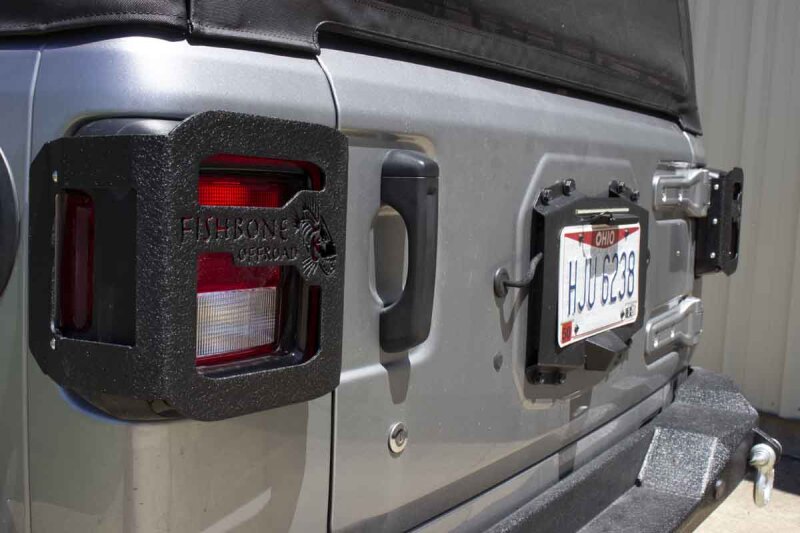 Jeep Wrangler Unlimited Tail Light Cover - Fishbone Offroad - Black textured powder coat - `18-`27